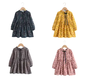 新しい卸売ガールズドレスコットン春と秋の断片化された花のレースアップ子供用ドレスファッショナブルなプリンセスドレス