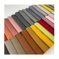 Tissu de canapé de luxe textile pour la nouvelle mode Matière première confortable en velours côtelé Tissu d'ameublement en velours côtelé uni en polyester pour canapé