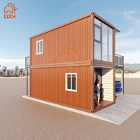 Maison conteneur modulaire préfabriquée démontable à deux étages en panneaux sandwich, personnalisée par l'usine DXH, pour appartement, école, villa