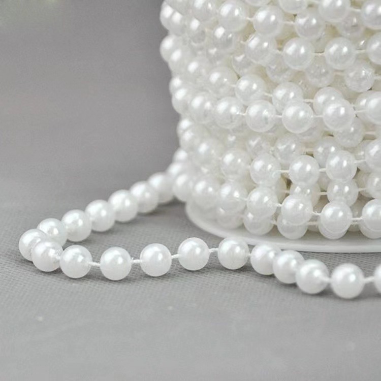 Un metro de cuentas de hilo de algodón de 6 mm (blanco)