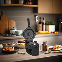 Mini gaufrier électrique domestique avec revêtement antiadhésif rotatif et pieds antidérapants, base stable.