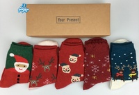 Chaussettes de Noël chaudes pour femmes, en polaire douce, avec semelles antidérapantes, idéales pour les fêtes, en lot cadeau