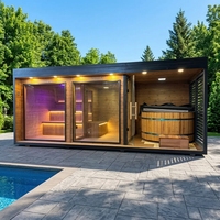 Sauna extérieur trois-en-un : douche, pavillon lounge et baignoire eau chaude/froide, grande sauna.
