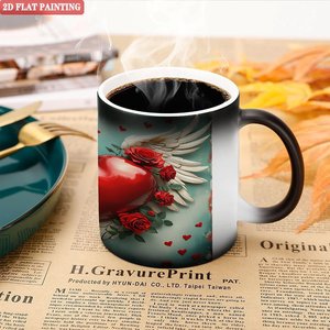 Taza Mágica de Cerámica Negra Esmerilada de 11 oz que Cambia de Color con Diseño de Alas de Corazón - Product Image 5