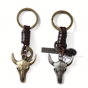 Llavero de metal estilo vaquero europeo occidental, con colgante de aleación de cobre y plata antiguo, cabeza de toro vintage y cuero de vaca bicolor - Product Image 5