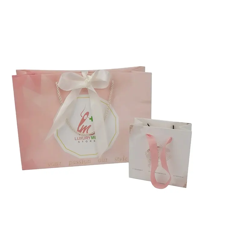 Venta al por mayor logotipo personalizado de color rosa flor bolsa de papel de arte con cuerda