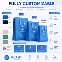 Sacs cadeaux en papier bleu marine de luxe avec poignées en corde à motif soleil doré, logo personnalisé pour les cadeaux d'entreprise, les boutiques de détail