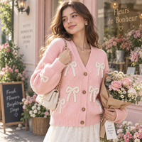 Cardigan rose personnalisé pour femme avec nœud, col en V, boutonné, manches longues, tricot 3D avec nœud, OEM ODM, faible MOQ