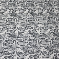 Tissu extensible tricoté brodé de paillettes scintillantes avec imprimé motif peau de serpent personnalisé en polyester pour robes de soirée