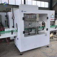 Machine de remplissage automatique anti-corrosion de 2000 BPH pour liquides, idéale pour les produits chimiques corrosifs et agrochimiques