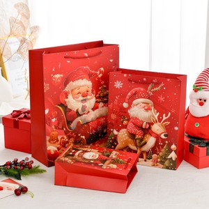 Großhandel Luxuriöse Rote Weihnachts-Geschenktüten aus Papier mit Henkeln für Feiertage und Partys - Product Image 1