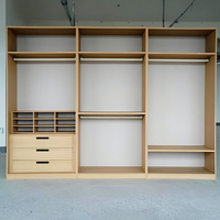 Armoire d'angle moderne et minimaliste sur mesure, démontable, avec portes battantes, écologique, grande capacité pour chambre à coucher