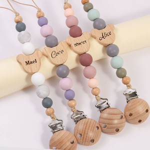 Vente en gros mignonne <span class=keywords><strong>attache</strong></span>-sucette en bois de hêtre pour bébés perles anti-chute de confort pour jouets des fabricants de commerce extérieur - Product Image 1