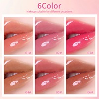 Gloss à lèvres liquide hydratant et repulpant à tête de massage métallique effet miroir, réduit les rides des lèvres