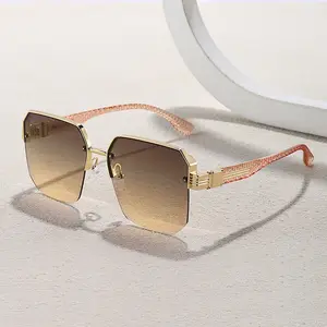 نظارات شمسية فاخرة uv400 بإطار معدني كبير على الموضة للرجال والنساء تُباع بالجملة جديدة لعام 2024