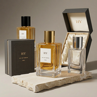 Flacon carré en verre transparent de 50 ml et 100 ml, côtés ondulés, pour parfum, avec bouchon cylindrique nervuré noir, or, argent, imprimé à l'écran, vaporisateur à pompe