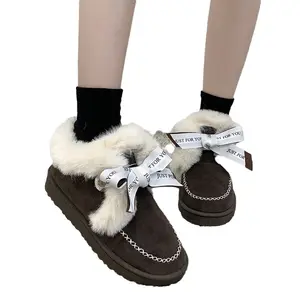 Stivali da neve integrati in pelle e pelliccia per le donne 2023 inverno nuove scarpe in peluche e cotone spesso, stivali corti con fiocco antiscivolo
