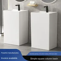 Lavabo sur pied en céramique intégré avec support de robinet monotrou, design moderne pour salle de bain