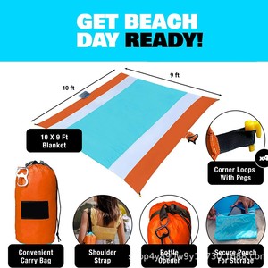 Tapis de pique-nique extérieur Woqi 10ft x 9ft, léger, en nylon, rectangulaire, avec sac de transport et piquets pour le camping et la plage - Product Image 2