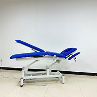 Table de massage professionnelle, table de chiropratique, réglage électrique de la hauteur, double commande, double moteur, à vendre