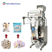 Machine automatique de pesage, remplissage et emballage pour bonbons, guimauves, bonbons gélifiés, bonbons acidulés, taffy, nougat triangulaire, cacahuètes et confiseries sucrées