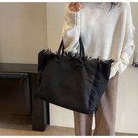 PROMO Sac fourre-tout en toile grande capacité pour femme, style coréen, motif lettres, ouverture supérieure, sac à bandoulière pour étudiante, plage, design de niche, pompon