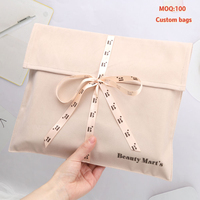 Emballage de bijoux en daim de logo personnalisé de luxe sac à chaussures en velours avec ruban imprimé portefeuille cahier enveloppe pochette pour vêtements