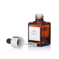 Flacon compte-gouttes carré en verre transparent à fond épais de 30 ml pour huiles essentielles et cosmétiques, avec marquage à chaud et logo personnalisé