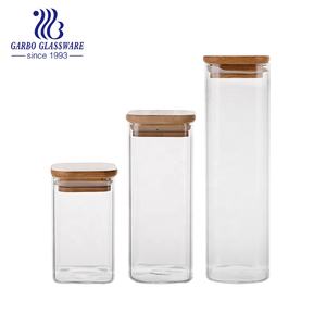 الجملة مخصص رخيصة مختومة اسطوانة الغذاء الحلوى حاويات مربع برطمانات تخزين زجاجية مع خشبية أعلى غطاء زجاجة حزمة - Product Image 1