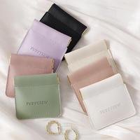 Pochette à bijoux carrée en cuir PU multicolore avec fermeture à bouton-pression, sac à bijoux en cuir souple, porte-monnaie, étui pour écouteurs, porte-rouge à lèvres