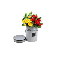 Boîte à fleurs ronde en carton de luxe avec poignée en ruban personnalisée de haute qualité