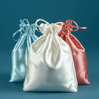 Luxe haute qualité cheveux soie cordon sacs Satin perruque cheveux sacs-cadeaux pochettes pour la fête d'anniversaire de faveur de mariage