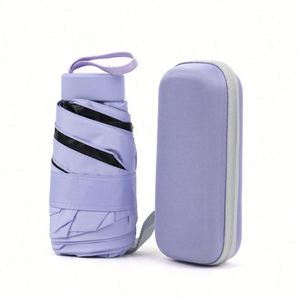 Sombrilla Plegable Portátil Mini con Protección UV y Refugio, Tipo Cápsula - Product Image 1