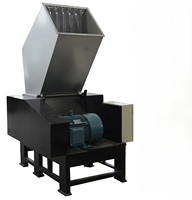 Broyeur à axe unique robuste conçu pour le recyclage du plastique, du PVC, des déchets plastiques et des matériaux composites aluminium-plastique