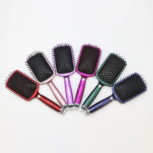 Cepillo de aire de tres colores con dientes de silicona y mango de plástico para uso doméstico, cepillo de masaje para alisar el cabello para mujeres. - Product Image 1