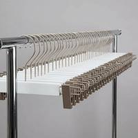 Cintre professionnel robuste antidérapant pour pantalons avec clips métalliques résistants à la rouille, idéal pour organiser pantalons, jupes et jeans