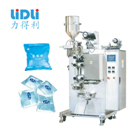 Machine de remplissage de sachets de jus 250ml Petit sac dans une boîte en plastique Eau Jus de lait Machine de remplissage automatique