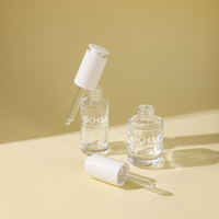 Özel silindirik kare konik şekli 30ml sıvı kozmetik cilt bakımı Serum Push Button cam damlalık şişe