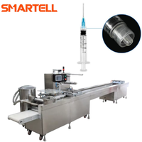 Machine d'emballage automatique électrique Smartell pour kits de perfusion à seringue jetable, contrôlée par PLC, moteur haute productivité, souple
