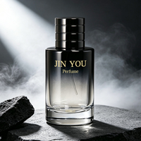 Vente en gros d'usine, flacon de parfum en verre vintage à logo personnalisé, dégradé de couleurs, cylindrique, fond épais noir, vaporisateur à pompe, écologique