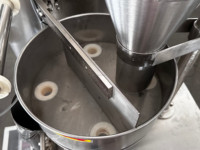 Machine d'emballage automatique pour scellage de particules