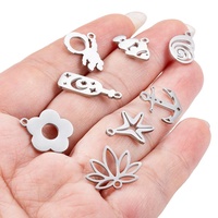 Petite breloque en acier inoxydable sur le thème de la mer fleur étoile de mer astronaute ancre conque pendentif résultats de bijoux et composants en stock