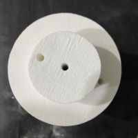 Blocs d'étanchéité en fibre céramique thermoformés avec trous pré-perforés pour la protection de l'entrée des éléments chauffants