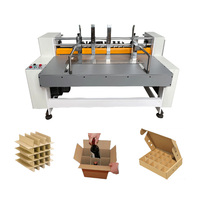 Machine automatique de découpe et de partitionnement de petites boîtes en carton