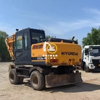 Excavatrice sur pneus Hyundai d'occasion de haute qualité, modèle 2013, 15 tonnes, moteur, boîte de vitesses, pompe, d'origine coréenne, en vente
