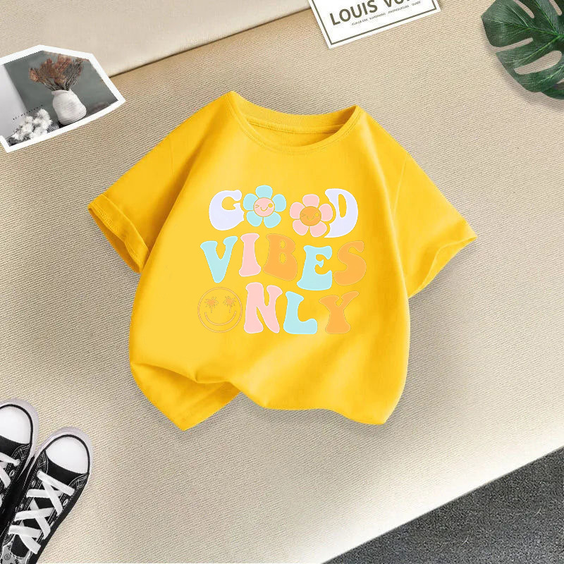 Yellow t-shirt with two smiling flowers