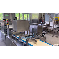 Ventes chaudes, machine à pain au beurre Tongguan à haute efficacité, ligne de production, contrôle PLC, acier inoxydable 304, capacité de 2000 à 6000 pièces/heure