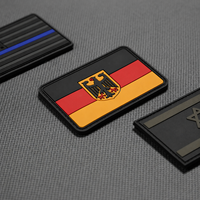 Großhandel Mehrfarbige Outdoor-Abenteuer-Stil 3D Geprägte Gummi-Patch-Abzeichen Benutzerdefiniertes Logo PVC-Patch mit Klettverschluss