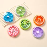 Voyage poche enfant adulte boîte à pilules créatif Portable Mini 7 jours hebdomadaire forme circulaire rotatif mignon fruits Style pilule boîte de rangement