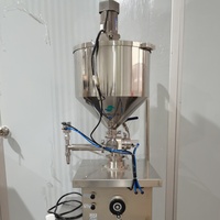 Machine de remplissage semi-automatique à température constante pour pâtes, vaseline et crèmes, avec trémie chauffante et fonction de mélange